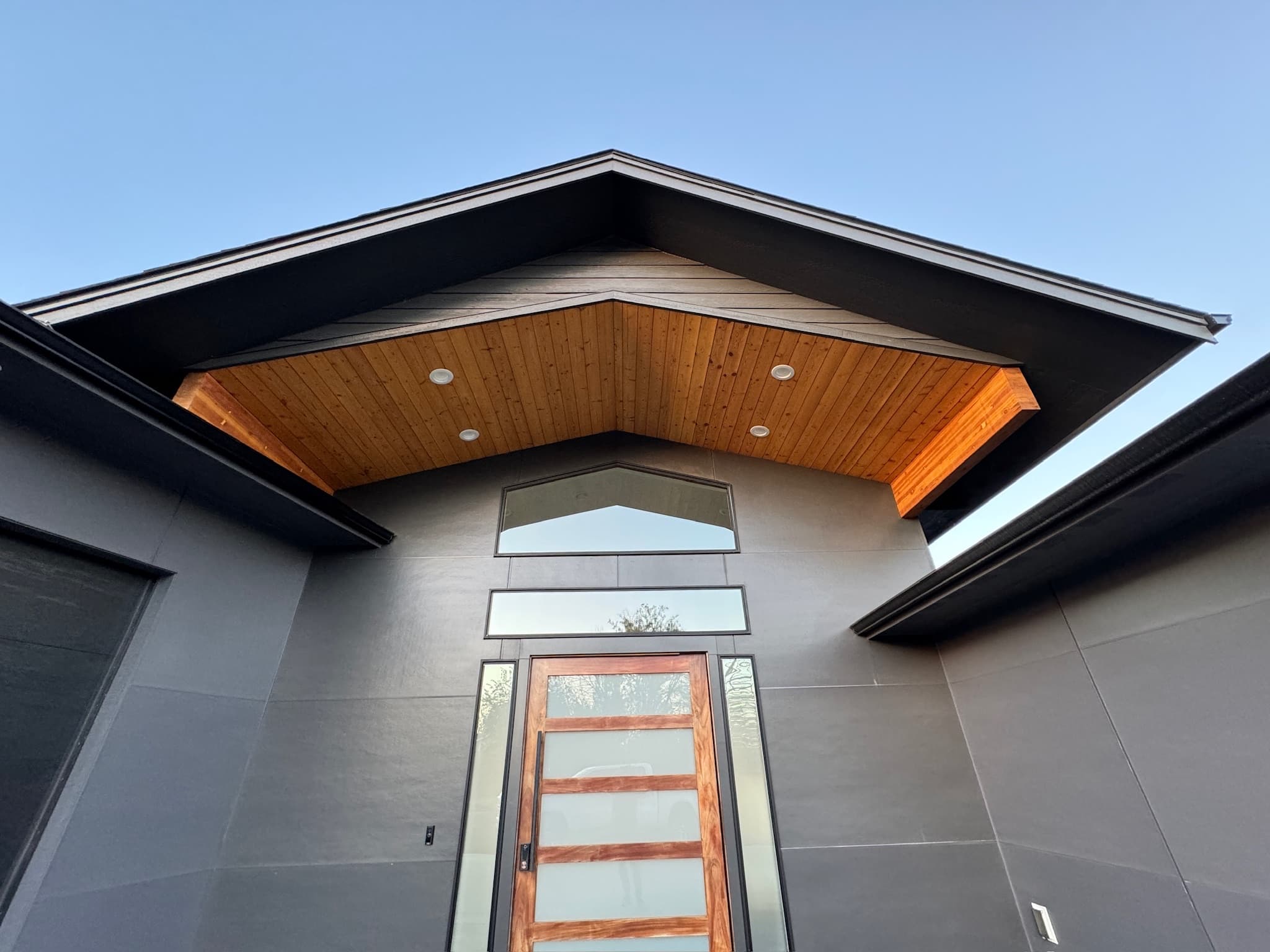 Modern Spokane, WA entry soffit with warm wood finishing