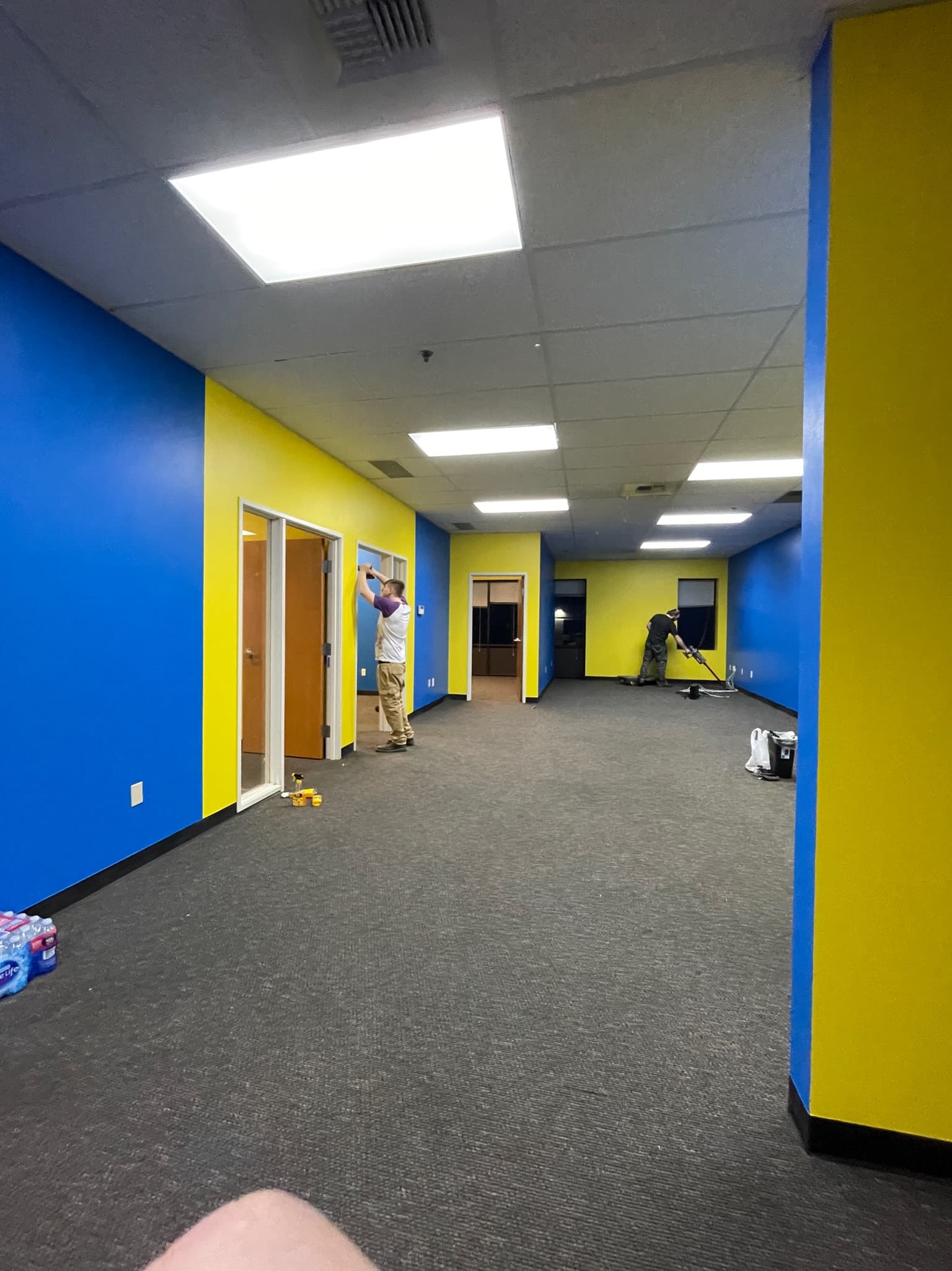 Blue and yellow drywall interior painting in a Spokane, WA commercial space
