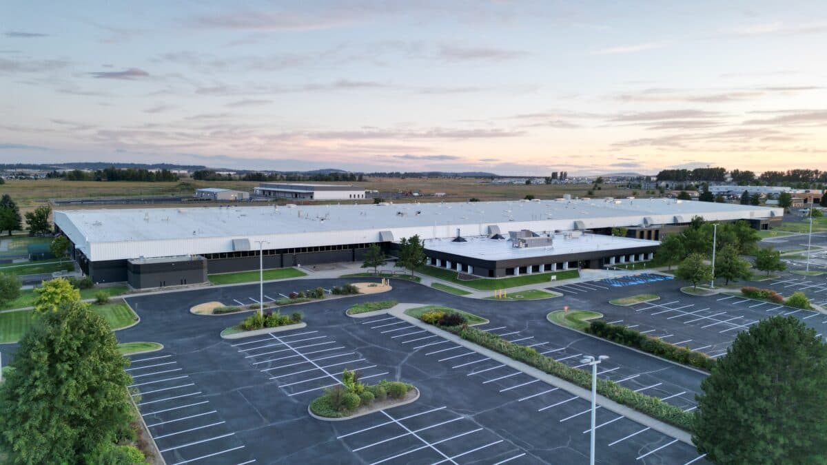 Spokane, WA warehouse facade and parking lot after commercial painting