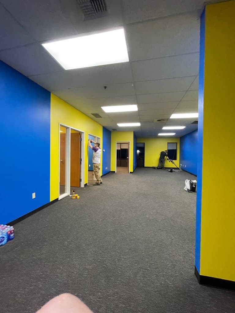 Blue and yellow drywall interior painting in a Spokane, WA community space